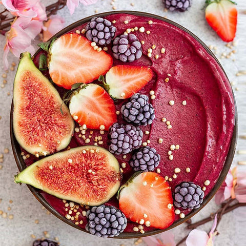 Açaí Bowl with pomegranate and strawberry